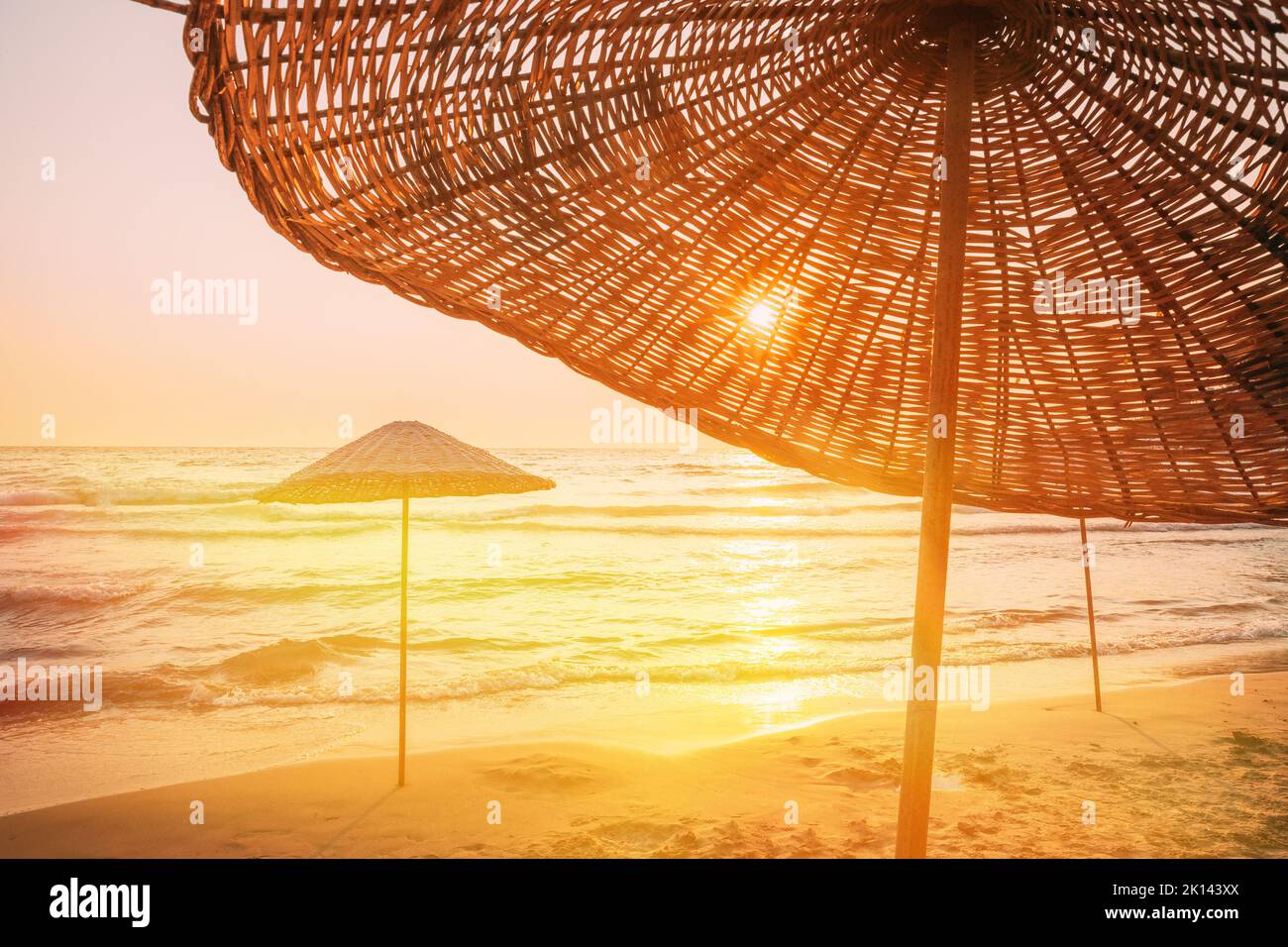 Wicker Beach Umbrella At Mediterranean Resort. Vacation Concept