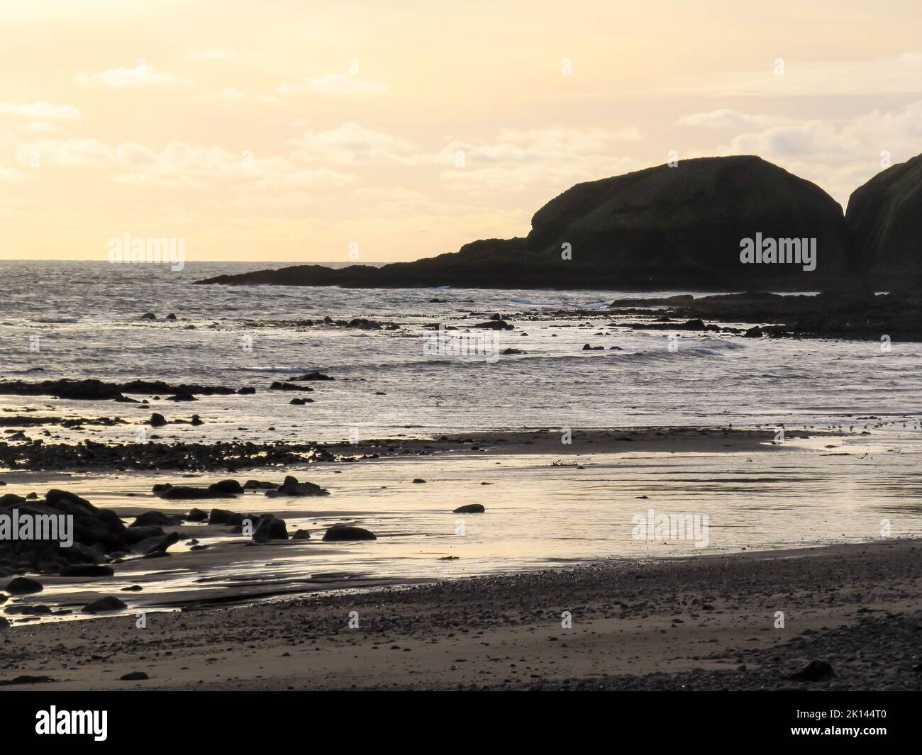 Tranquil dawn along the Rugged Scottish coastline with the North sea. Stock Photo