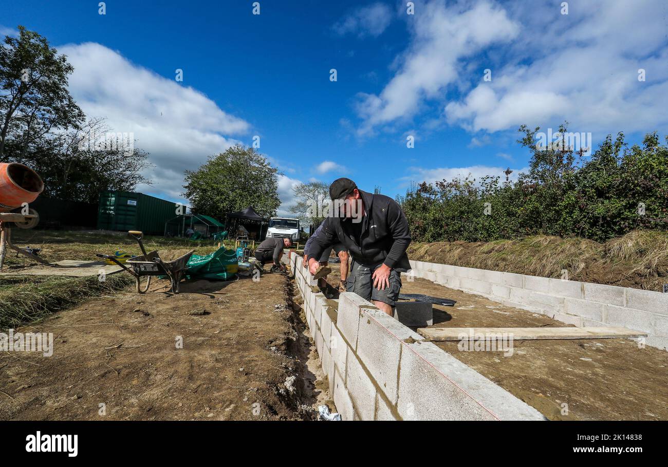 Rural construction. Building a stable base within grazing paddocks. Stock Photo