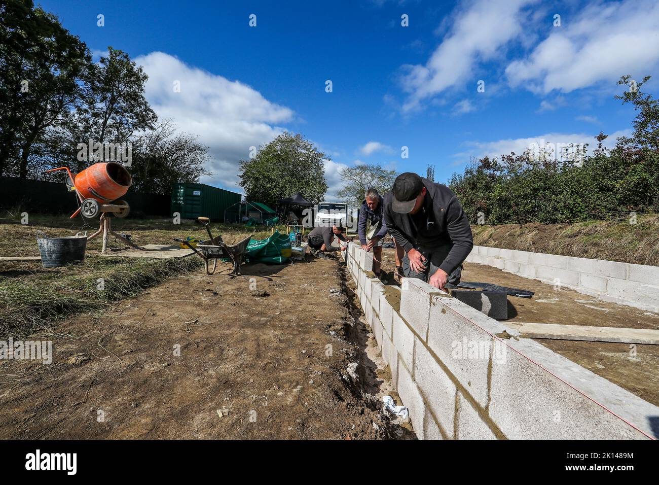 Rural construction. Building a stable base within grazing paddocks. Stock Photo
