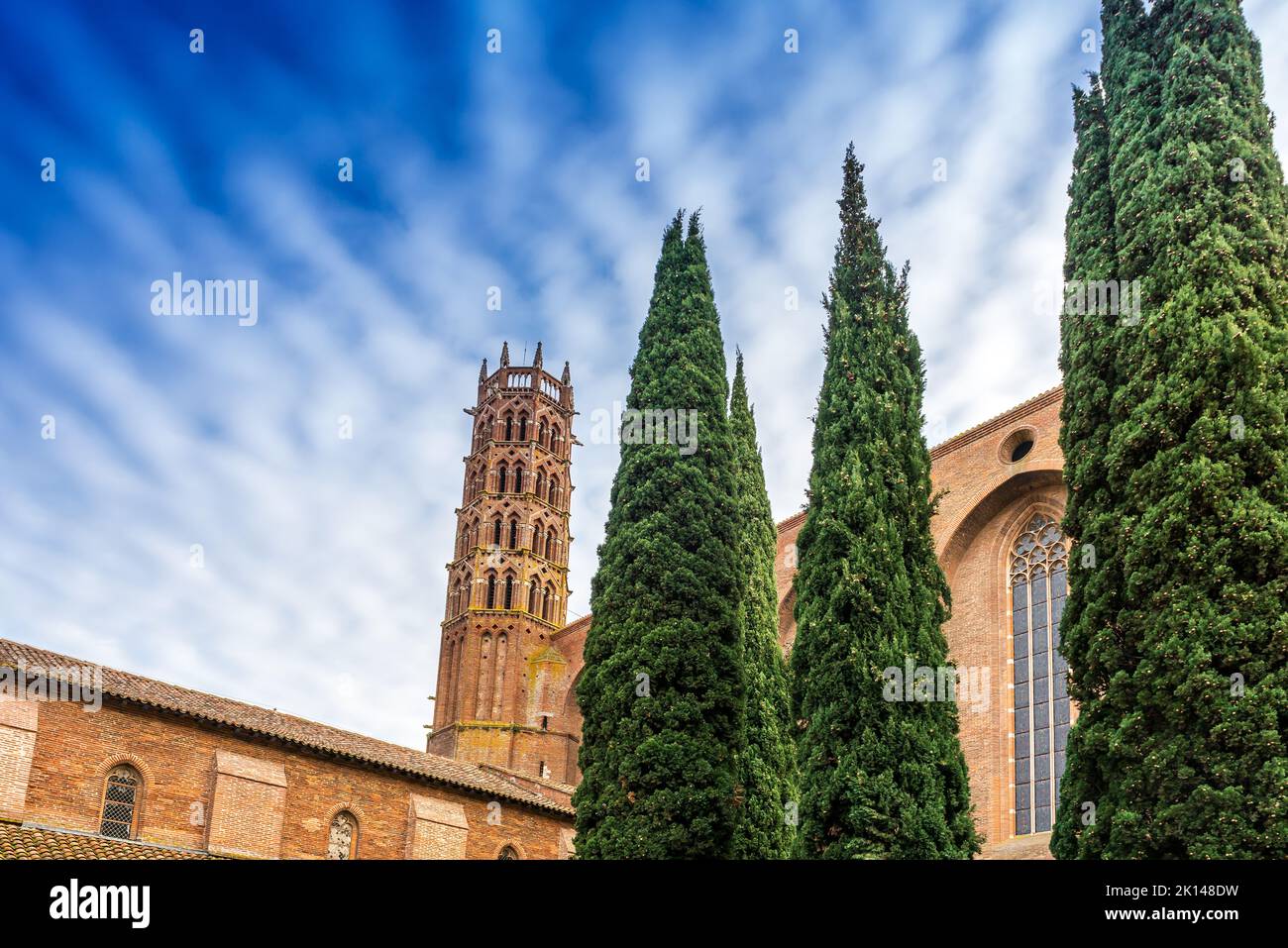 Campanile and garden of the Jacobins convent in Toulouse, Occitanie, France Stock Photo