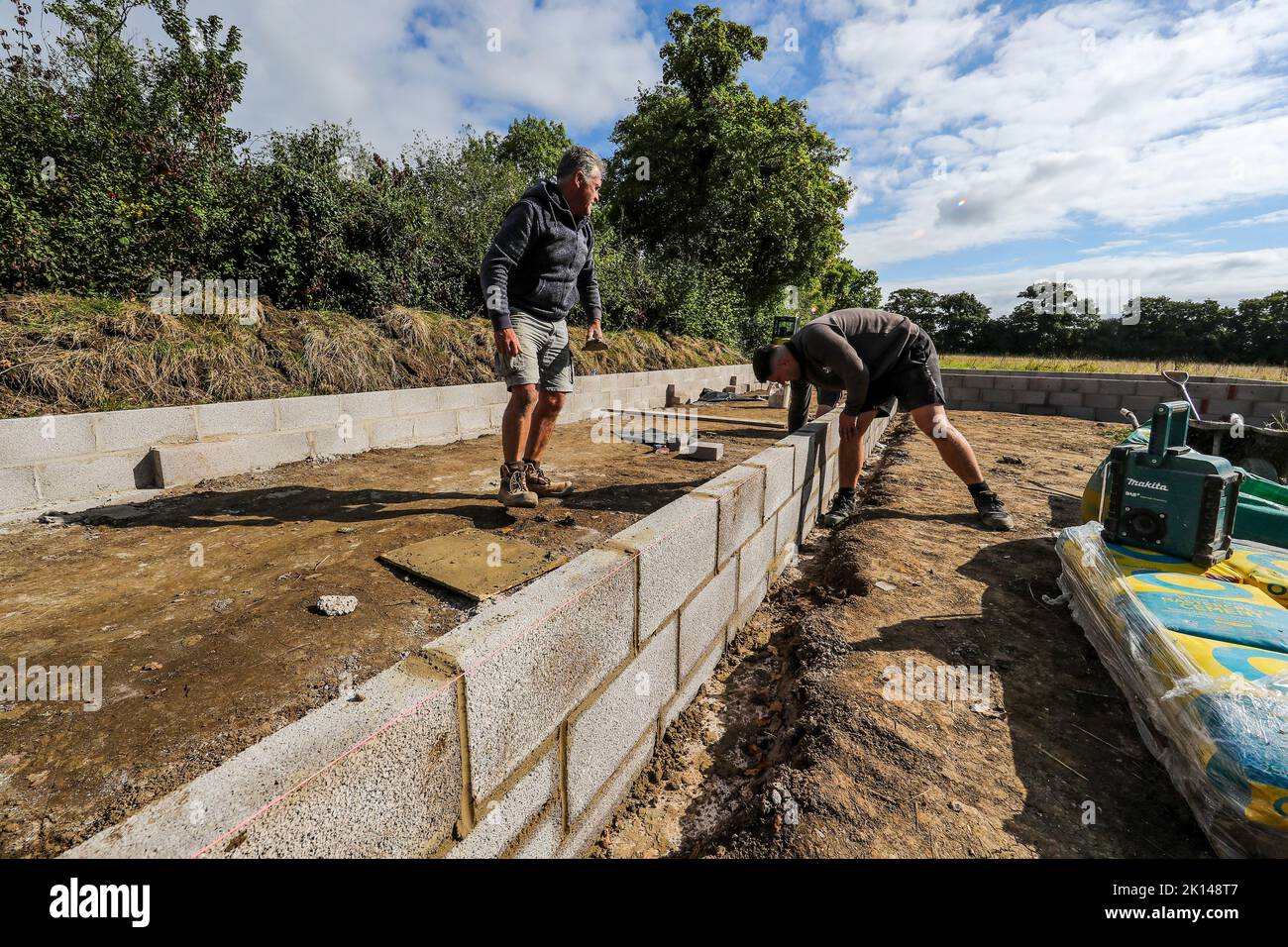 Rural construction. Building a stable base within grazing paddocks ...