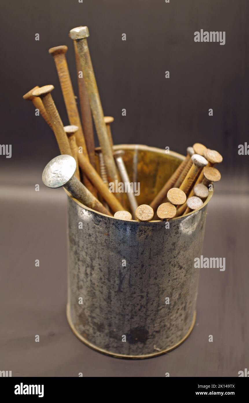 Rusty Nails in a can. Stock Photo