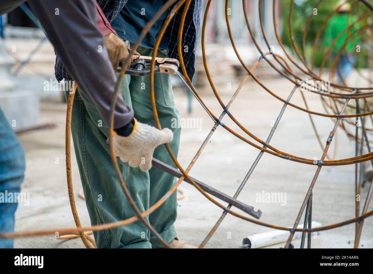 Blacksmith Technicians are welding several curve wires to form a ...