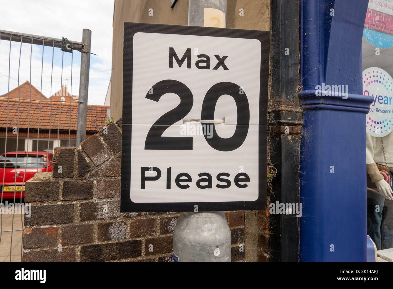 Max twenty please sign on a lamppost Stock Photo