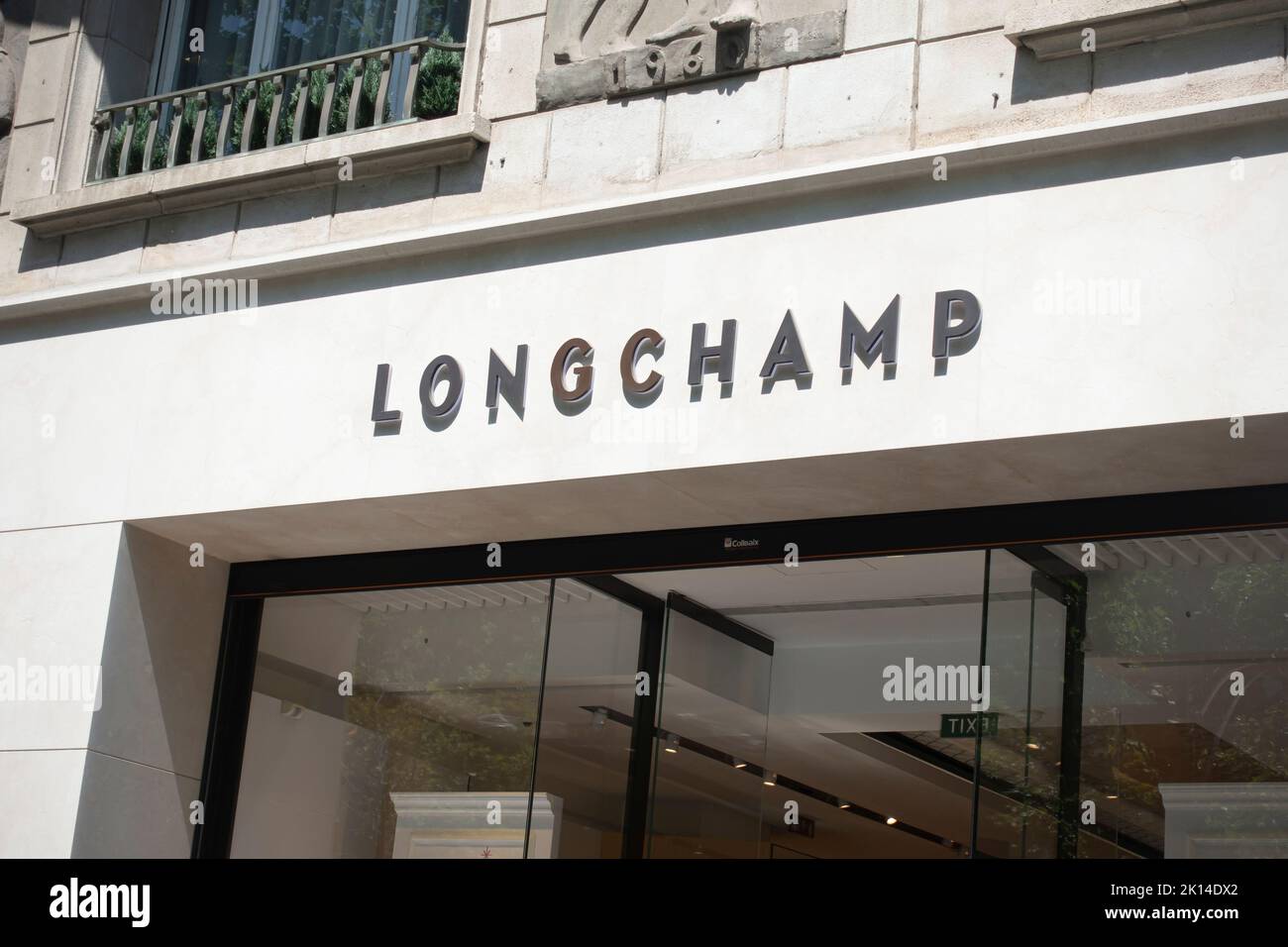 Barcelona, Spain - May 9, 2022: Longchamp store.. Longchamp is a French luxury leather goods company. Stock Photo