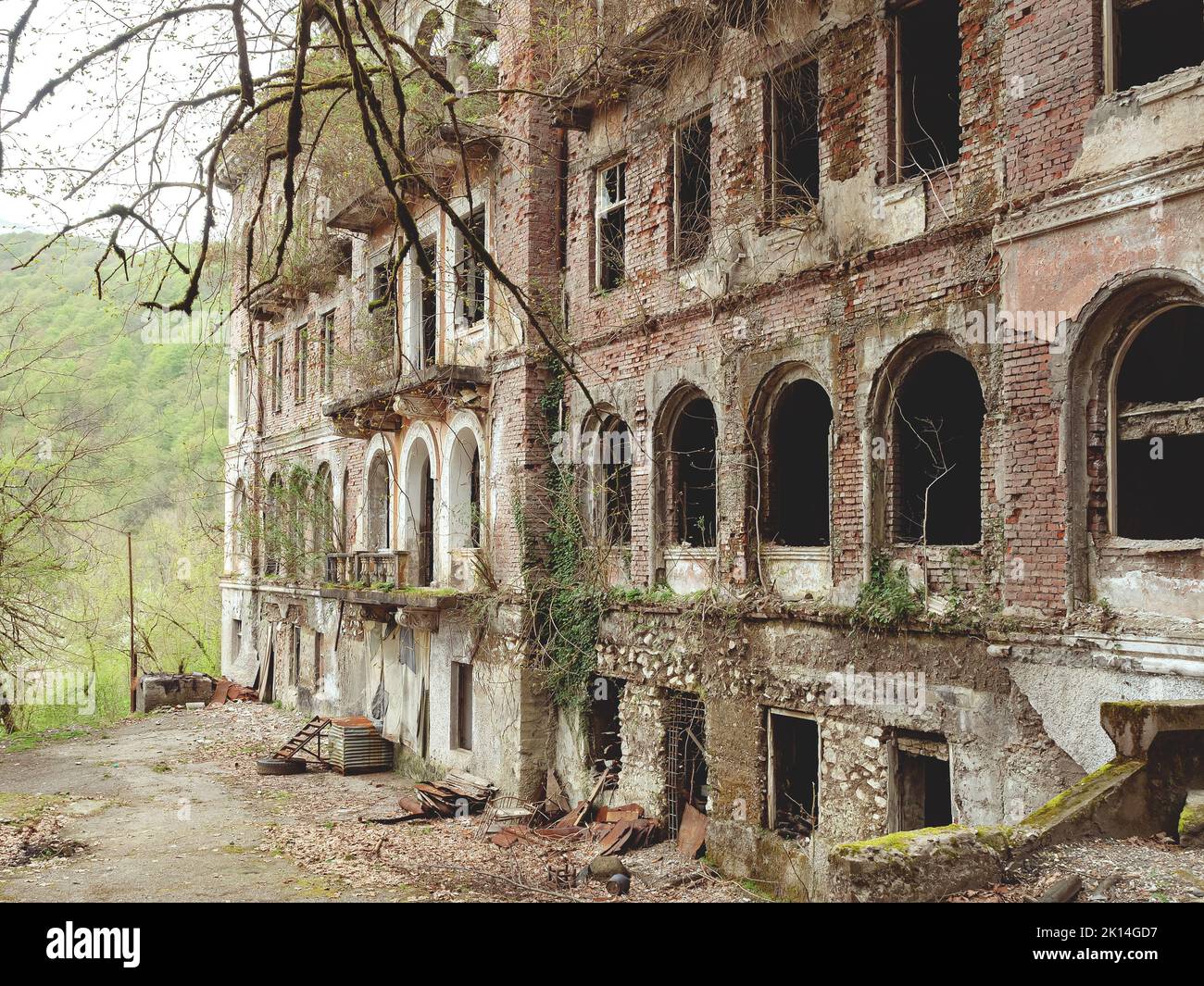 Large old abandoned house with arched windows in a green forest Stock ...