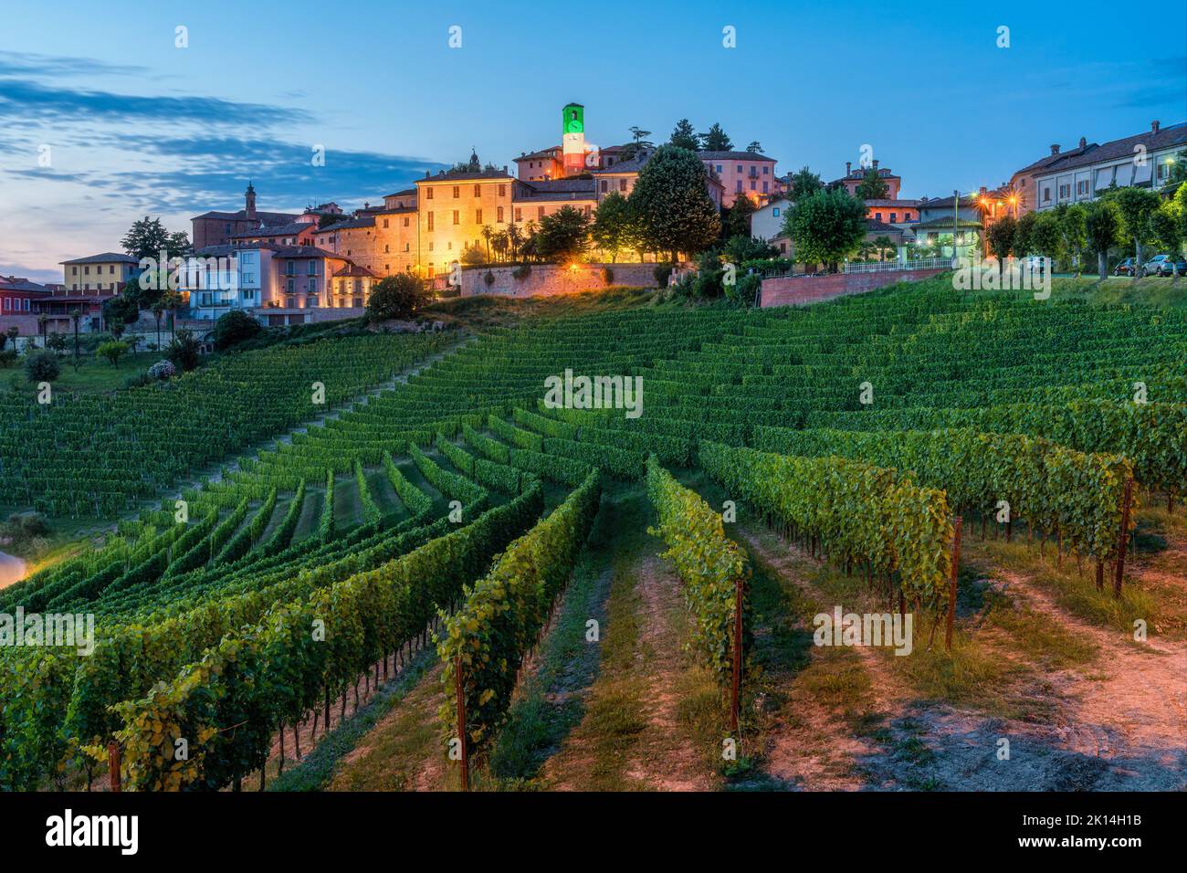 Neive village illuminated in the evening. Langhe region of Piedmont, Cuneo, northern Italy. Stock Photo