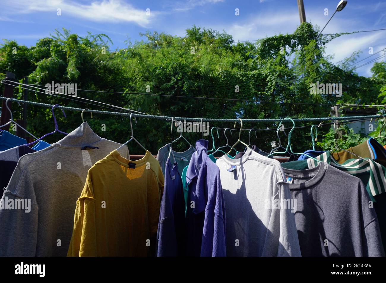 Hang clothes and pants to dry after washing Stock Photo Alamy