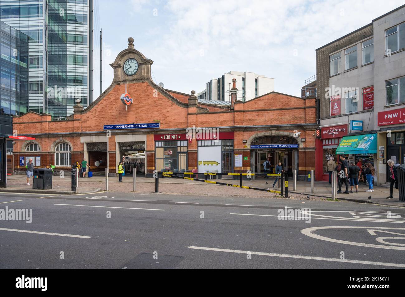 People out and about outside Hammersmith underground station. London