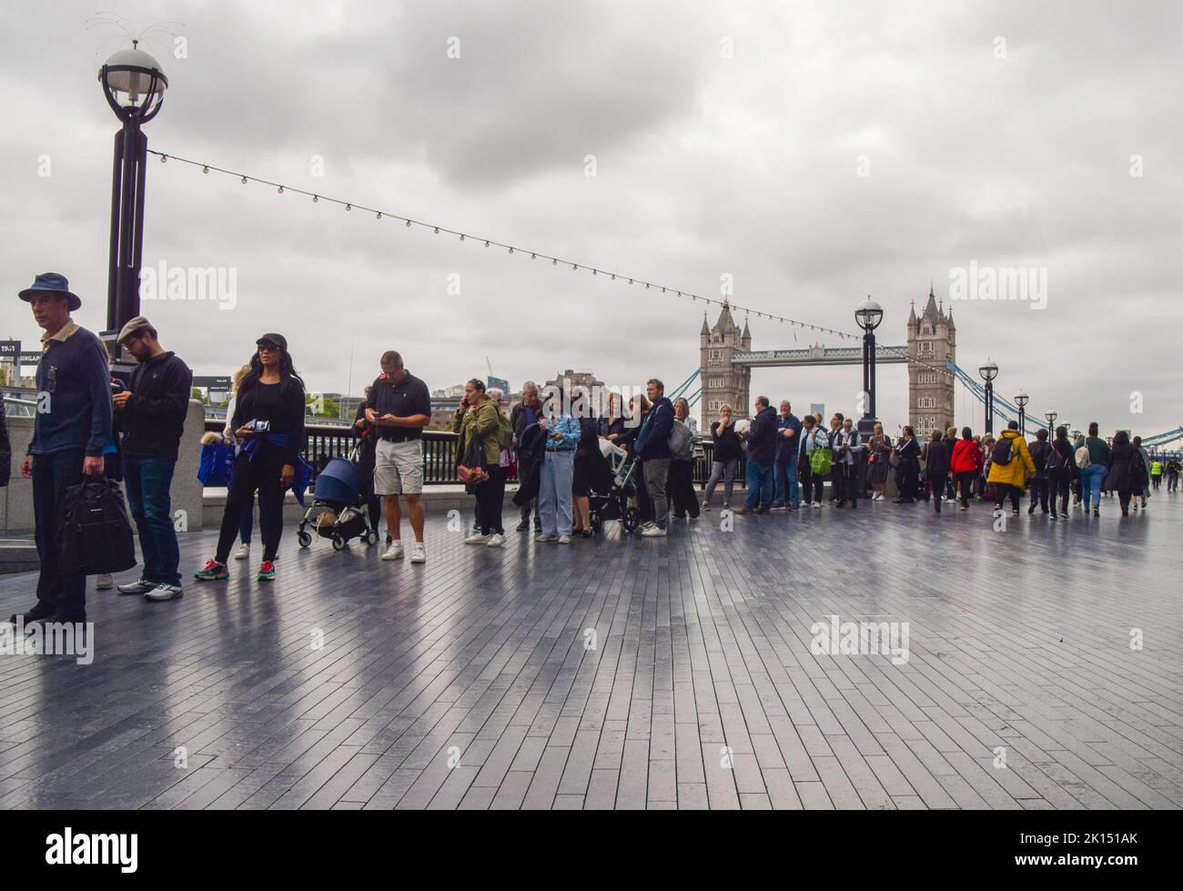 Mourners Wait In A Line Near Tower Bridge The Queue For Queen mourners-wait-in-a-line-near-tower-bridge-the-queue-for-queen
