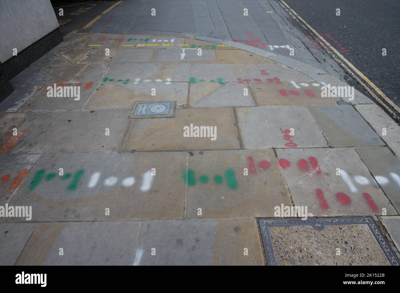 Locations of buried services pipes and cables hires stock photography