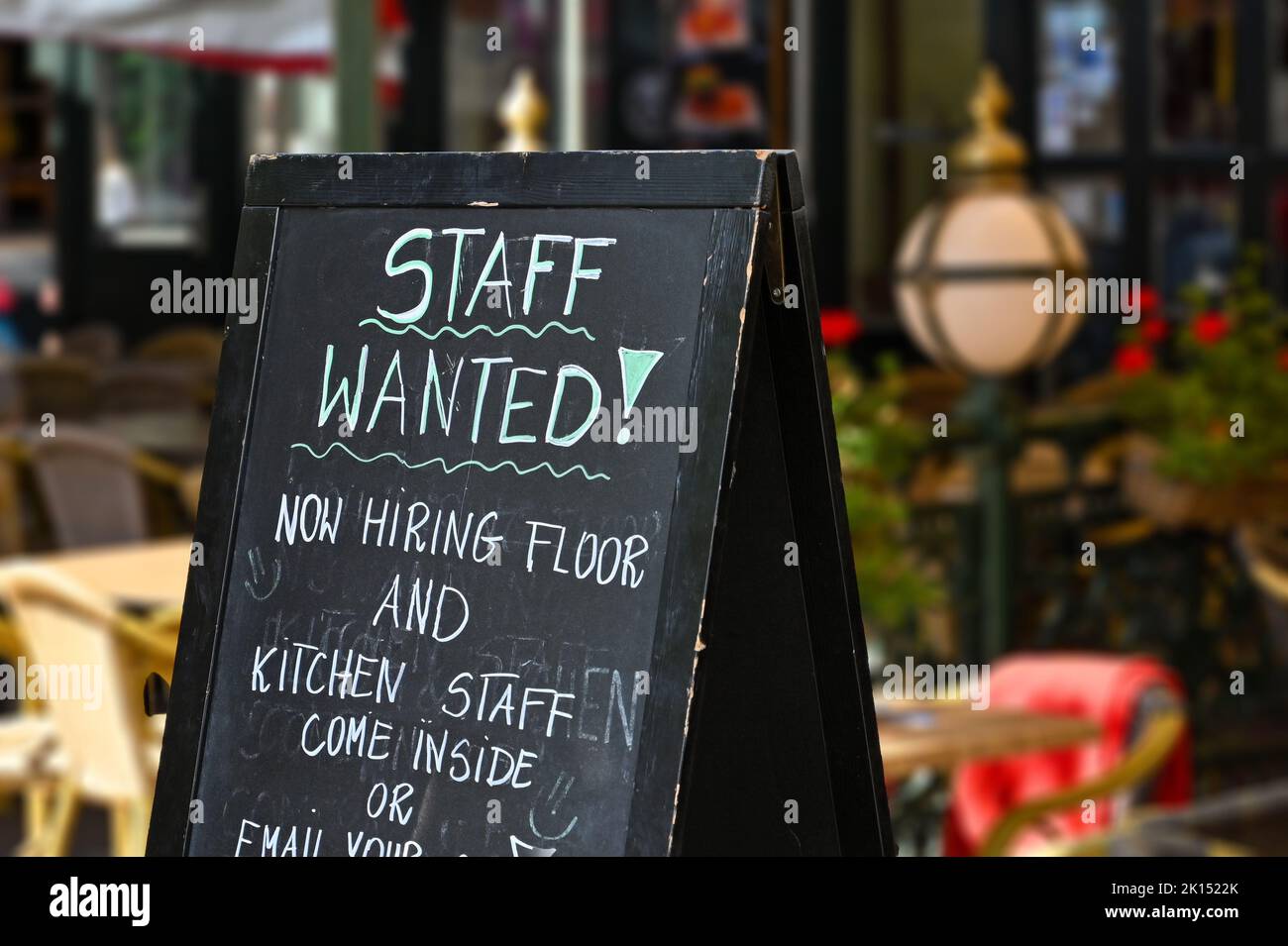 Staff wanted recruitment sign outside a restaurant in Europe Stock Photo