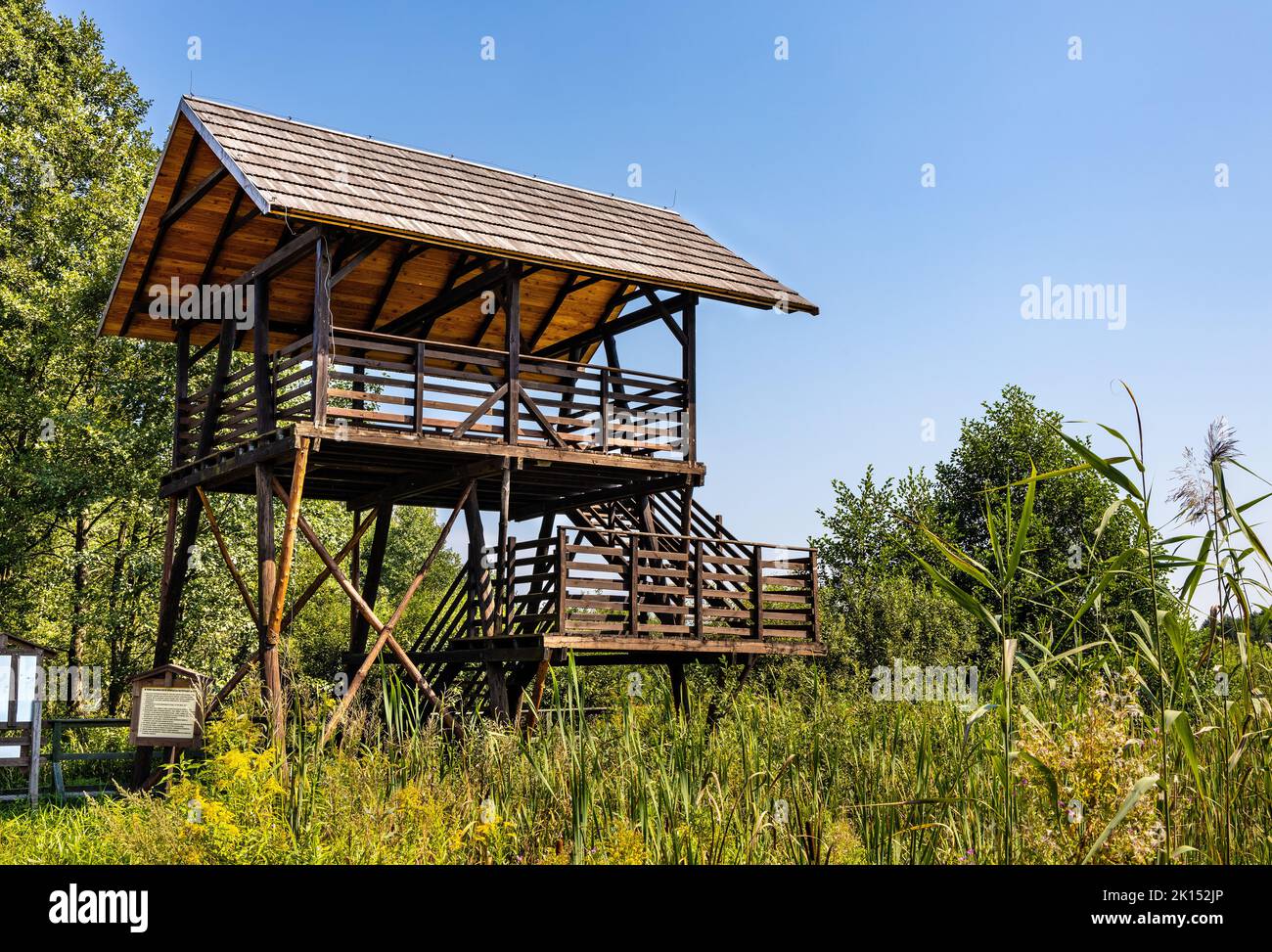 Calowanie, Poland - August 27, 2022: Observatory tower and platform overlooking Bagno Calowanie Swamp wildlife reserve in Podblel village south of War Stock Photo