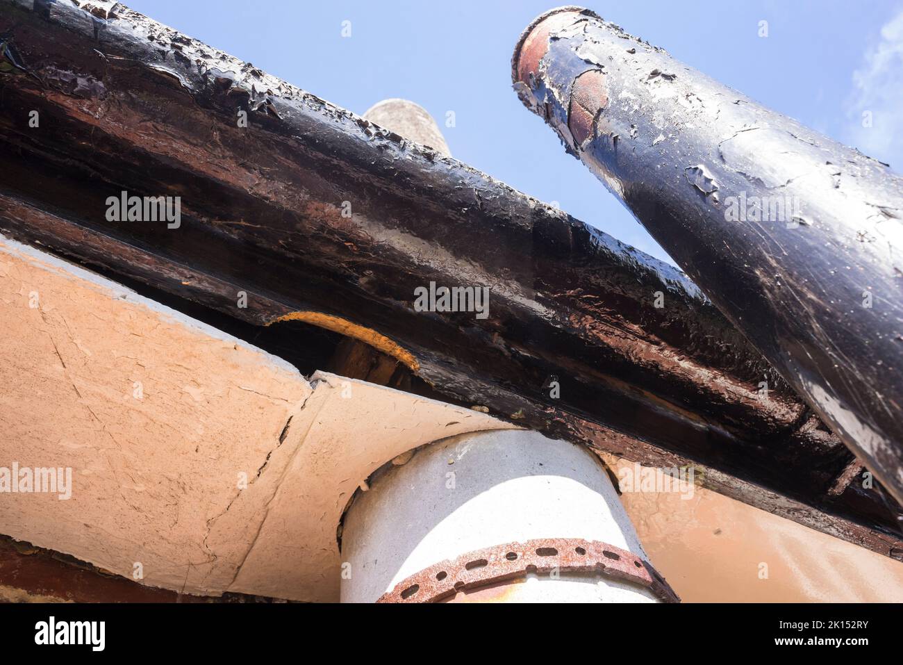 A poorly maintained lath and plaster soffit which has sagged allowing access and further damage by rodents. Stock Photo