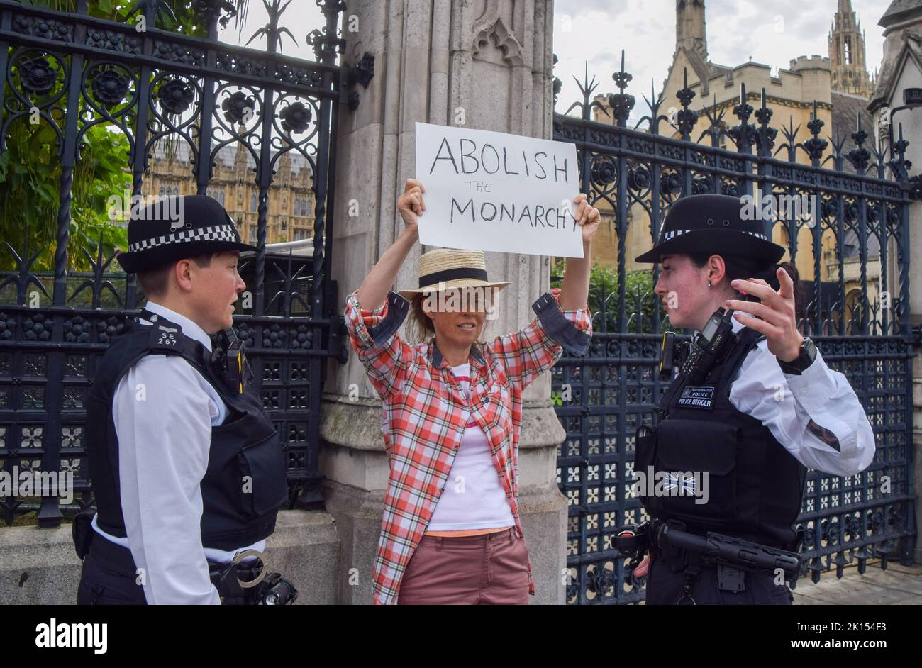 London, UK. 12th Sep, 2022. An anti-monarchy protester outside Parliament ahead of King Charles' arrival. King Charles III visited Parliament today to receive the Motion of Condolence. Stock Photo
