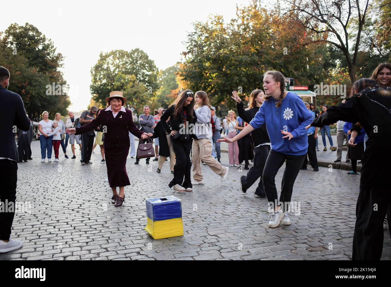 Odessa, Ukraine. 15th Sep, 2022. People are seen dancing to the street music band. Despite the full-scale invasion of the Russian Federation, on the weekends, joy and life reign on the main street of Odessa - Deribasovskaya, vacationers walk, dance, having fun, as in peacetime. Deribasovskaya street - one of the central streets of the city of Odessa, is one of the main attractions of the city.Since the end of the 20th century, most of Deribasovskaya has been closed to traffic and is a pedestrian zone. Deribasovskaya is a popular place for festivities. There are numerous cafes and shops on Stock Photo