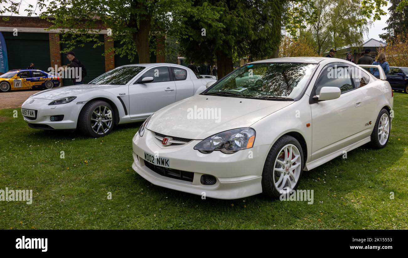 2002 Honda Integra ‘WDO2NWK’ & Mazda RX-8 ‘AX57 FAM’ on display at the April Scramble held at the Bicester Heritage Centre on the 23rd April 2022 Stock Photo