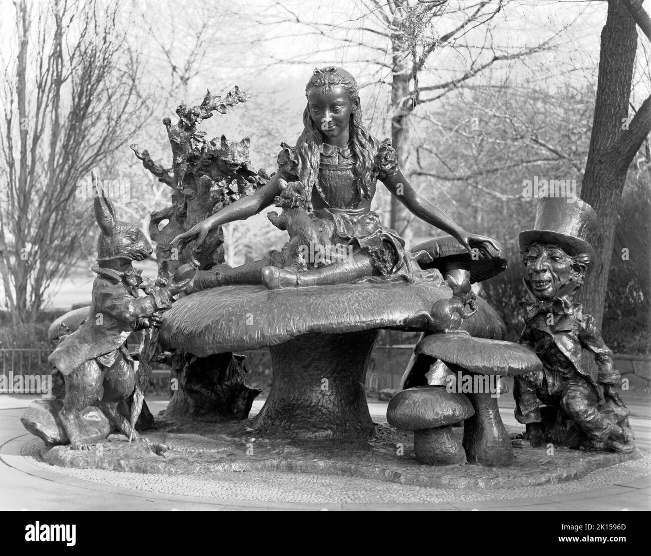 Alice in Wonderland statue in Central Park, New York City, USA.  Photographed in the winter, image was shot with a large film in Black & White Stock Photo