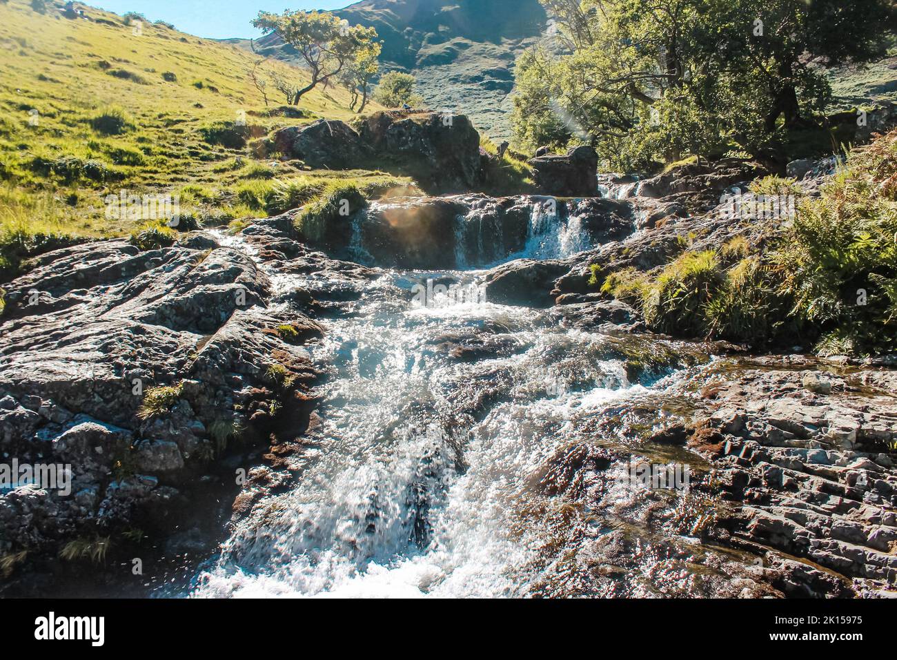 Beautiful waterfall stream in the Watkin Pools in Snowdonia National Park in Wales in summer Stock Photo