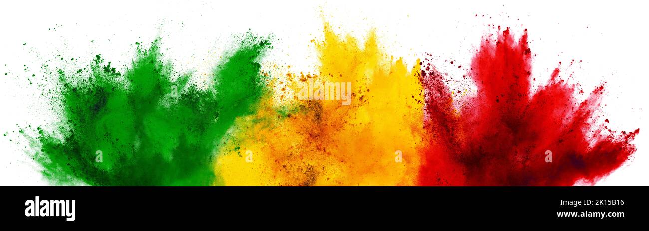 colorful ghanaian or senegalese flag green red yellow color holi paint powder explosion on isolated white background. Ghana senegal africa qatar celeb Stock Photo
