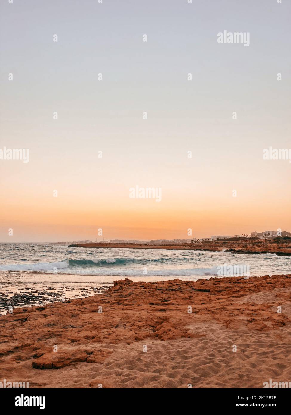 Beautiful views of the sea in Famagusta Bay from a rocky beach at sunset near Ayia Napa, Cyprus Stock Photo