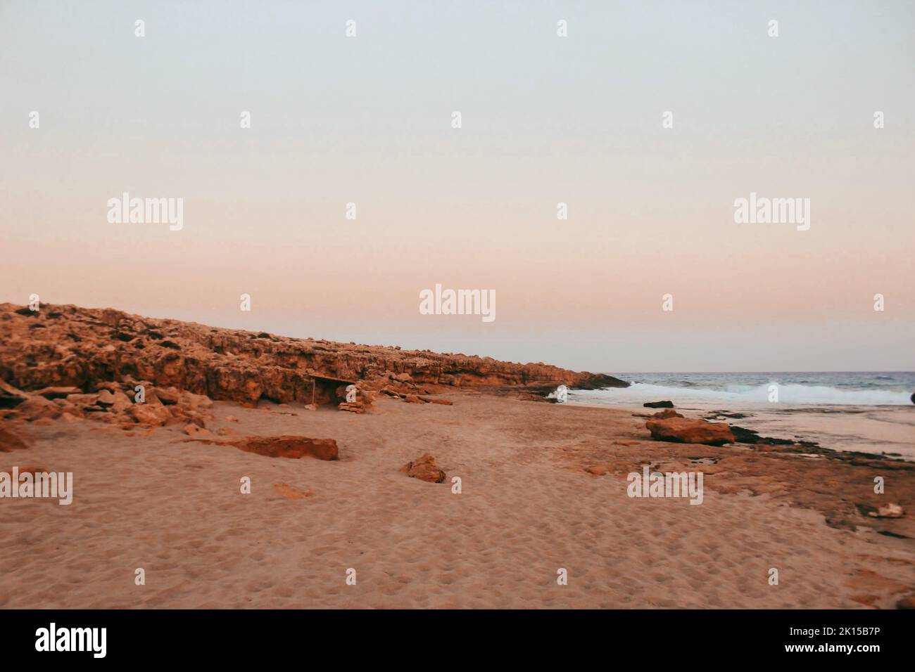 Beautiful views of the sea in Famagusta Bay from a rocky beach at sunset near Ayia Napa, Cyprus Stock Photo