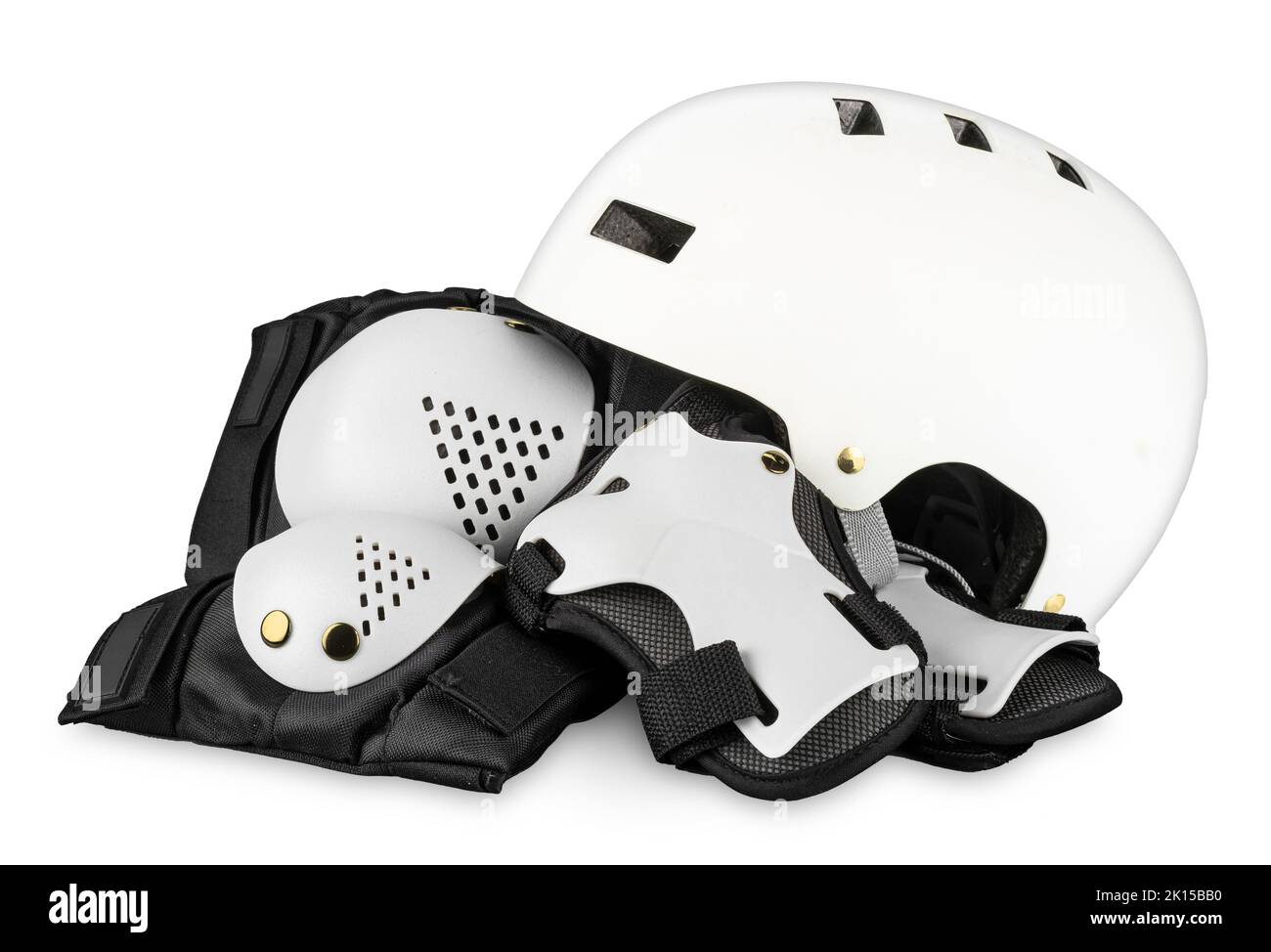 White black skateboard or inlane skating saftey equipment like skate helmet wrist knee and elbow protector pads on isolated background with clipping p Stock Photo
