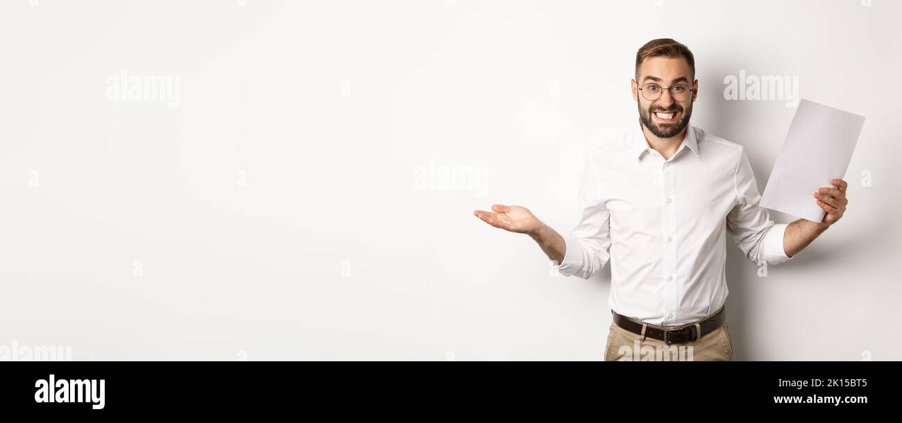 Awkward manager showing document and shrugging, looking guilty of ...