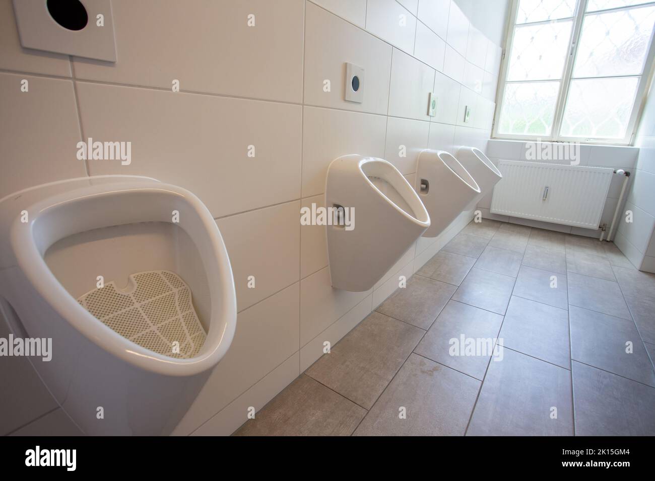 Close up of urinal in public toilet. Hygiene concept Stock Photo Alamy