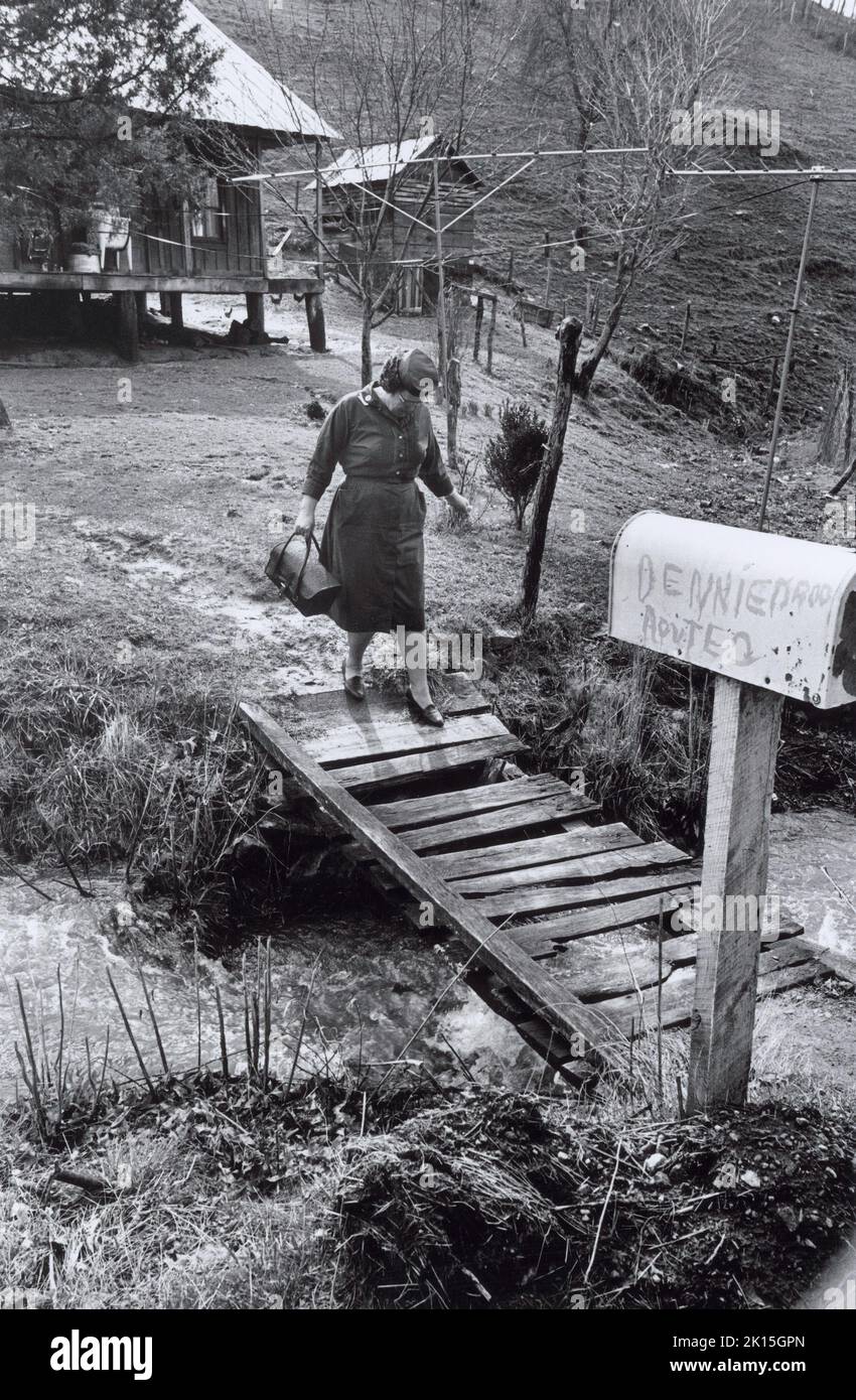 Anna Fox, was the first county heath nurse in the mountains of western North Carolina, bringing medical care to people who had never seen a doctor. Here, she heads out on a housecall; 1965. Stock Photo