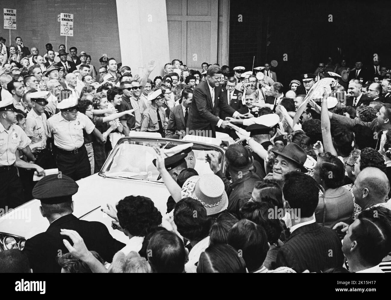 Presidential candidate John F. Kennedy (May 29, 1917 - November 22, 1963) is greeted by hundreds of people as he campaigns in October, 1960, in Charlotte, NC. JFK carried North Carolina in the election. Stock Photo