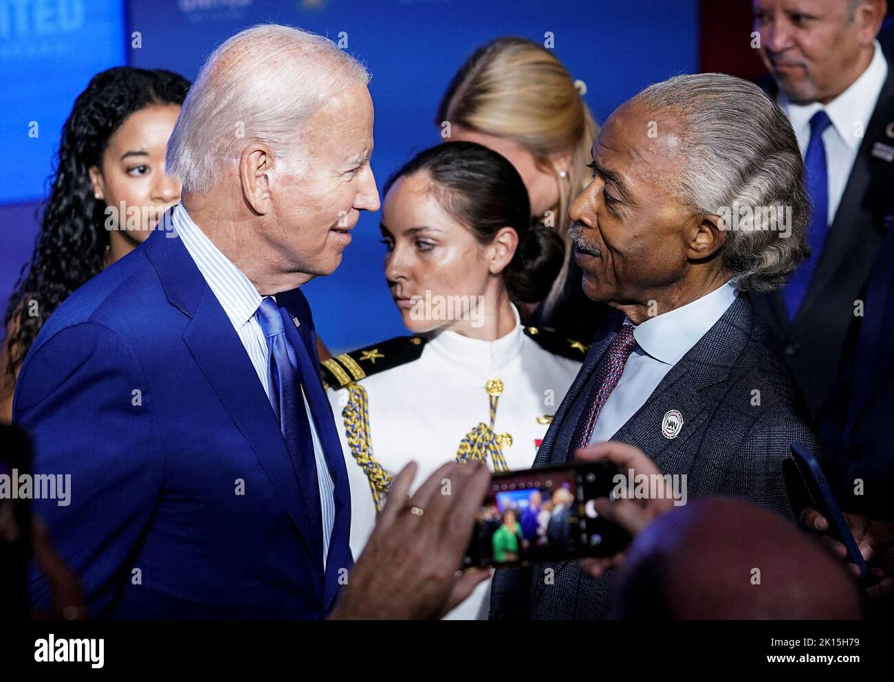 U.S. President Joe Biden greets Rev. Al Sharpton after delivering remarks at the 'United We Stand' summit on countering hate-fueled violence, at the White House in Washington, U.S., September 15, 2022. REUTERS/Kevin Lamarque Stock Photo