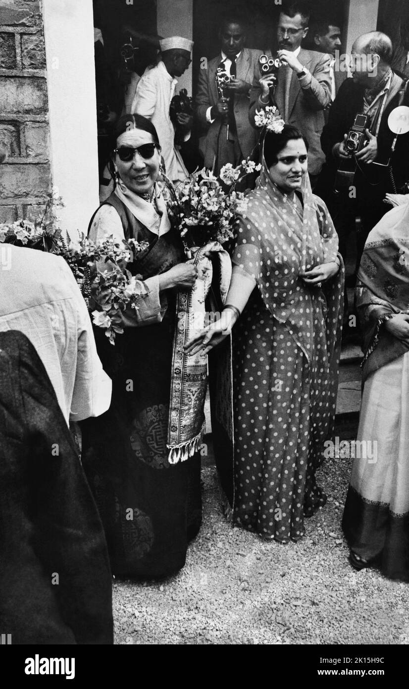 The mother of the 14th Dalai Lama on their arrival in Mussoorie, India, on April 19, 1959. The Dalai Lama fled Tibet at the outset of the 1959 Tibetan uprising and established the Government of Tibet in Exile, now the Central Tibetan Administration, in Dharamsala, northern India. Stock Photo