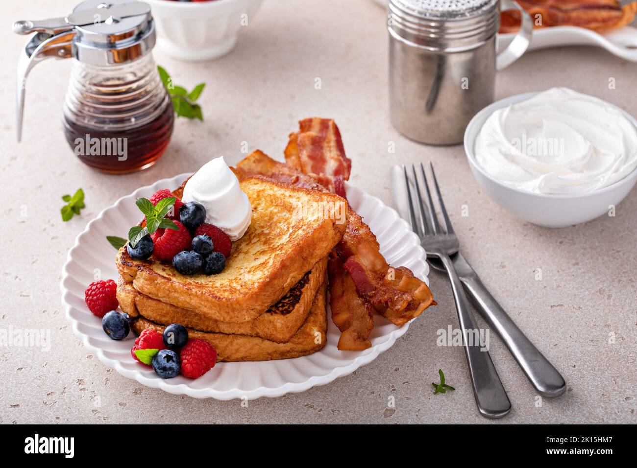 Classic french toast with bacon and berries Stock Photo