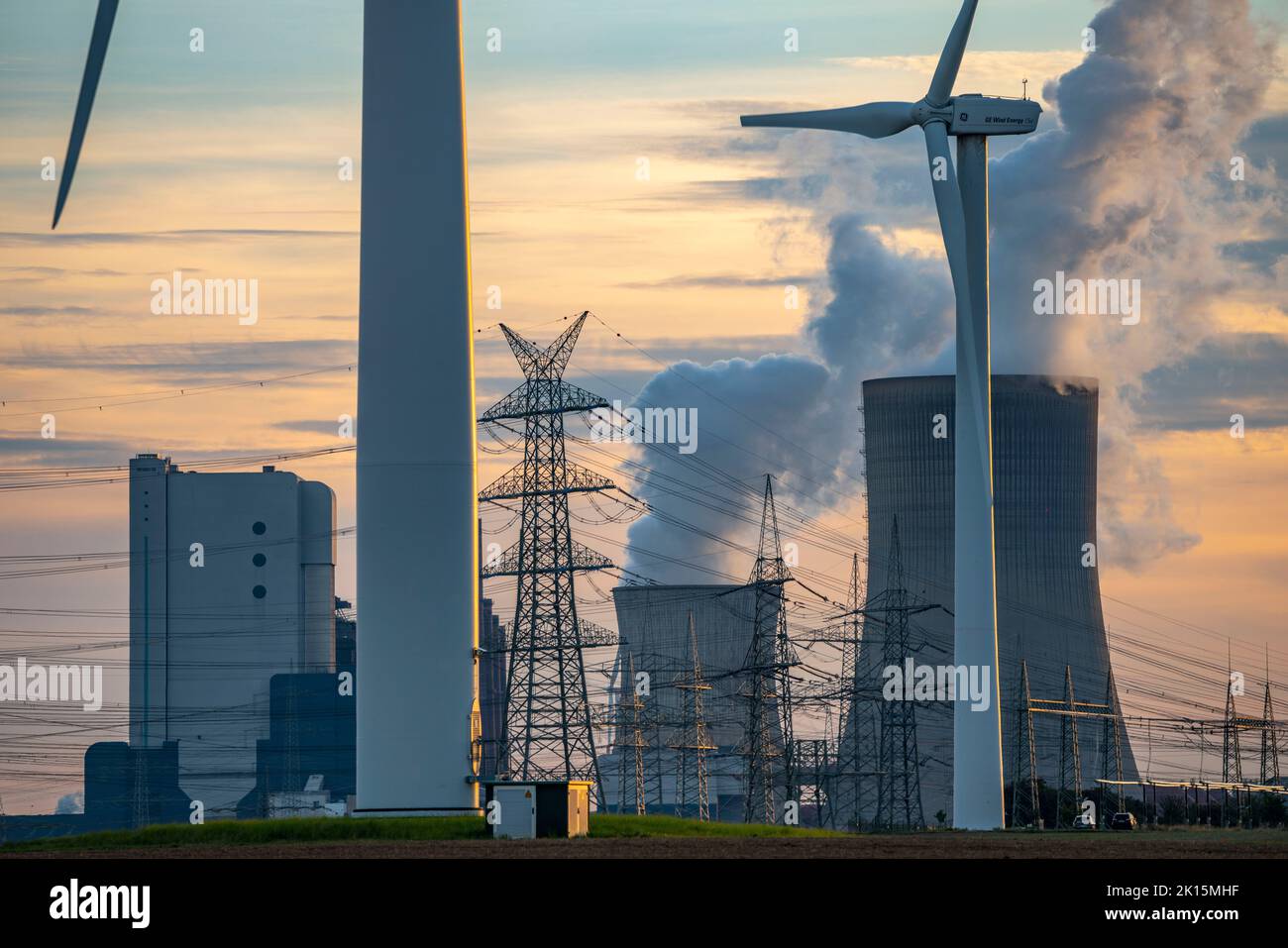 Lignite-fired power plant, RWE Power AG Niederaussem power plant, wind turbines, 2 units shut down in 2020/21 and restarted in June 22 to replace gas- Stock Photo