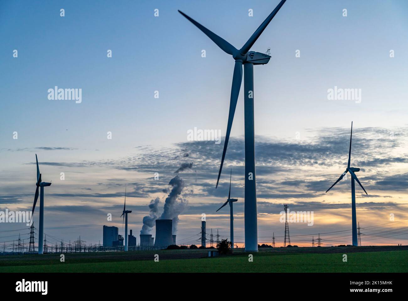 Lignite-fired power plant, RWE Power AG Niederaussem power plant, wind turbines, 2 units shut down in 2020/21 and restarted in June 22 to replace gas- Stock Photo