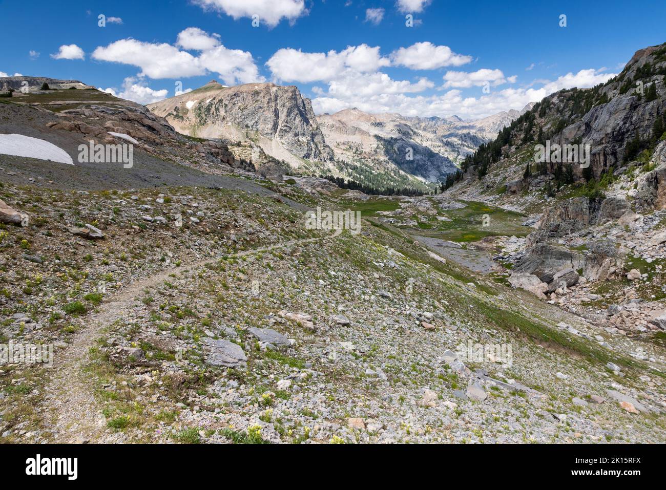 The Avalanche Divide Trail descending through alpine terrain into the