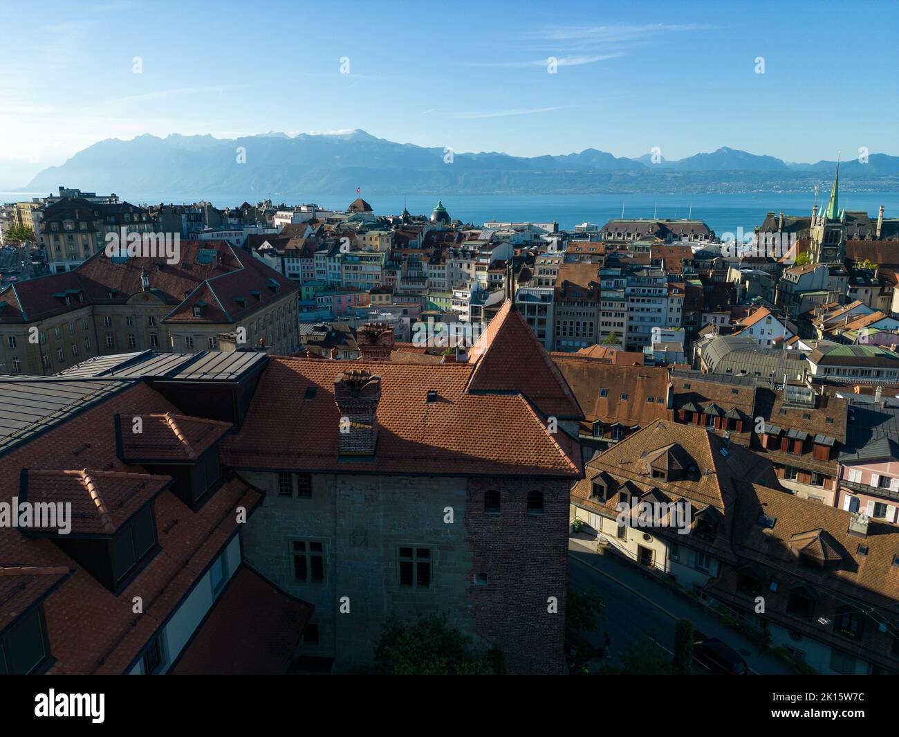 Lausanne, Switzerland, August 22nd 2022. Aerial drone shot of the city centre and lake Geneva in the background. Stock Photo