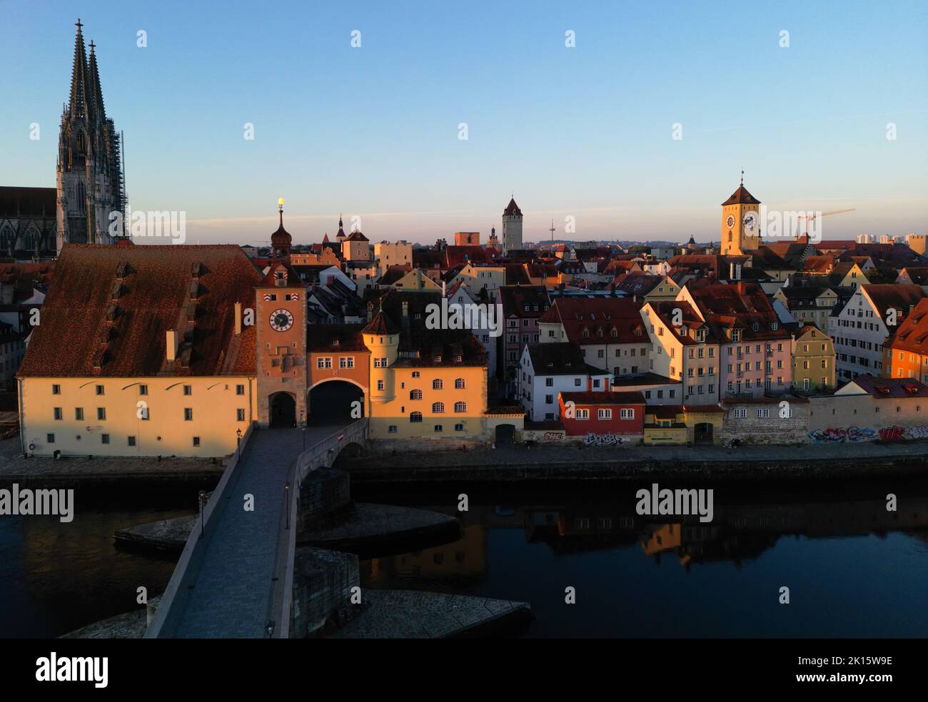 September 5th 2022, Regensburg, Germany. A drone shot of the old stone bridge, Bruckturm, cathedral of St Peter, and other buildings in the old city c Stock Photo