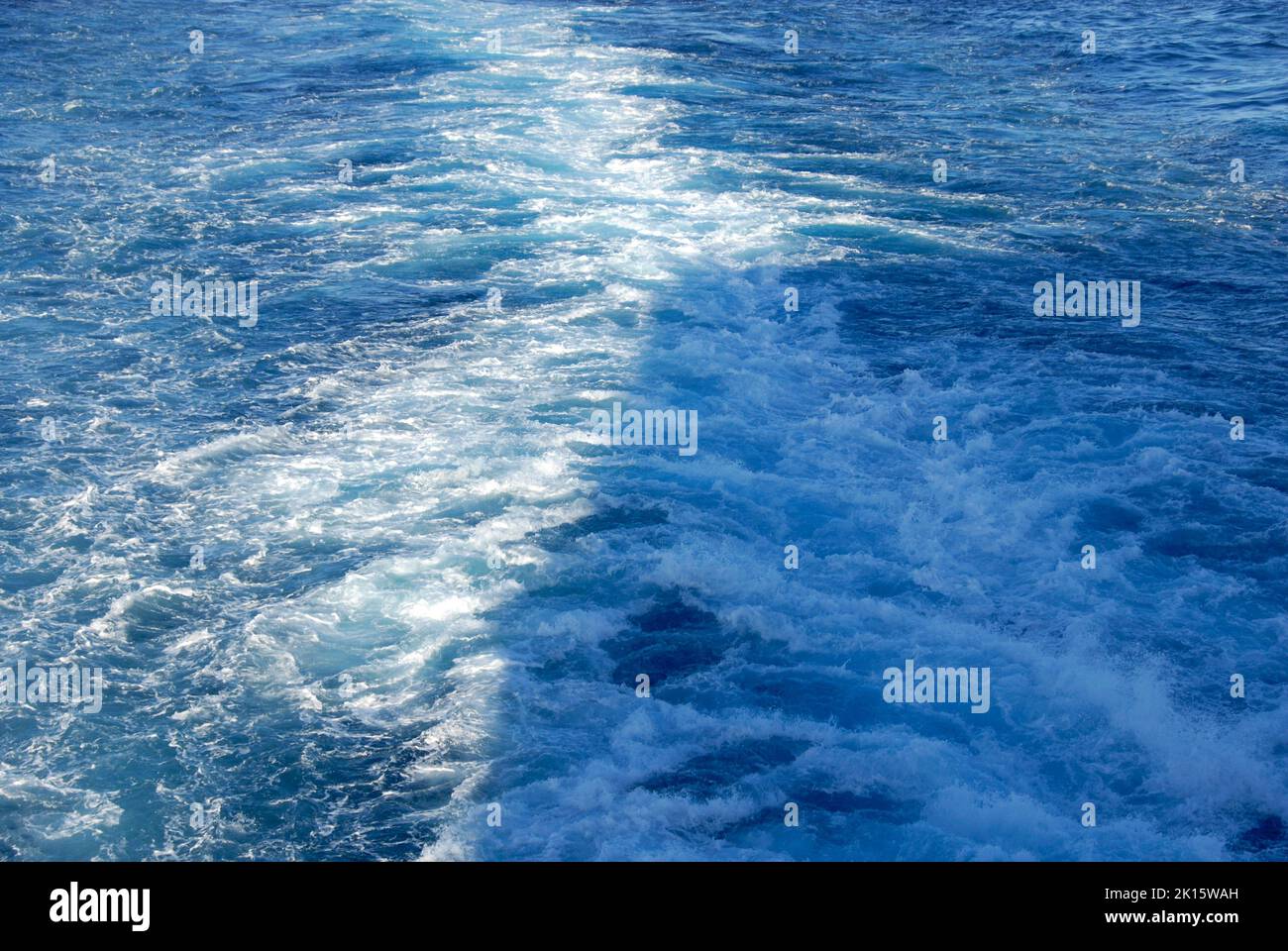 Wash behind cruise liner, with shadow of ship visible, Caribbean Stock Photo