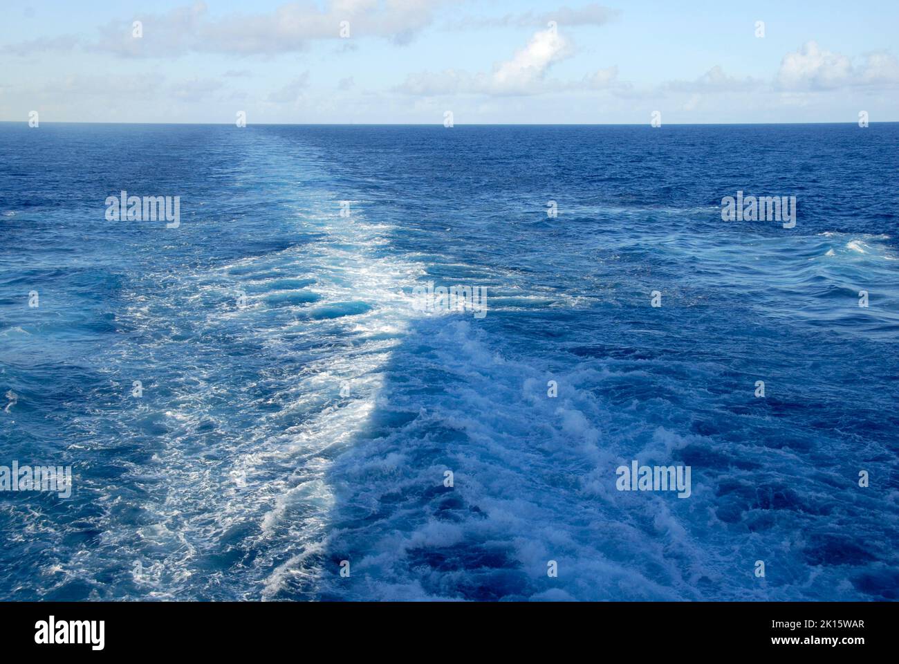Wash behind cruise liner, with shadow of ship visible, Caribbean Stock Photo