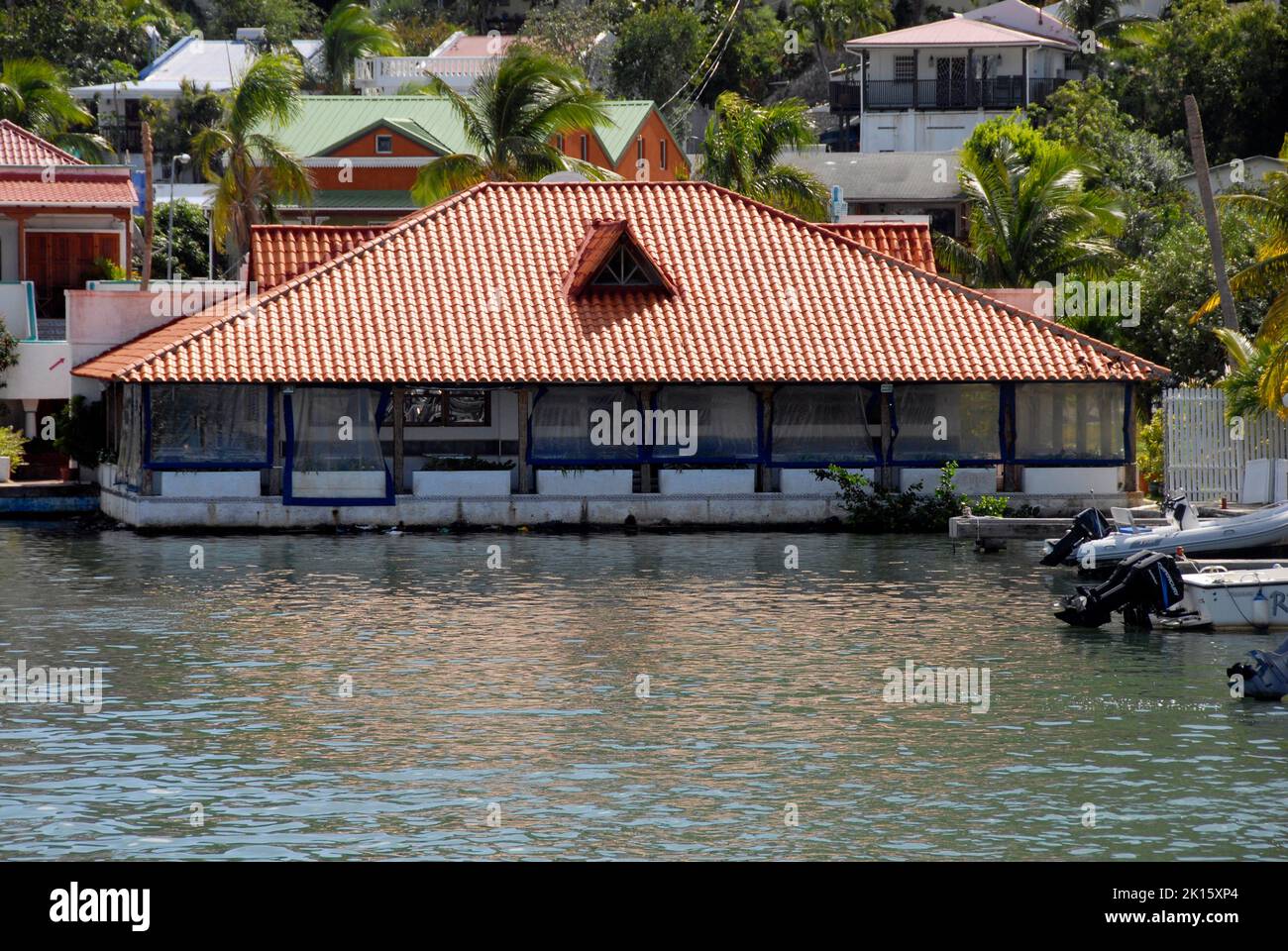 Low waterside house beside Simpson Bay Lagoon, Sint Maarten, Caribbean Stock Photo