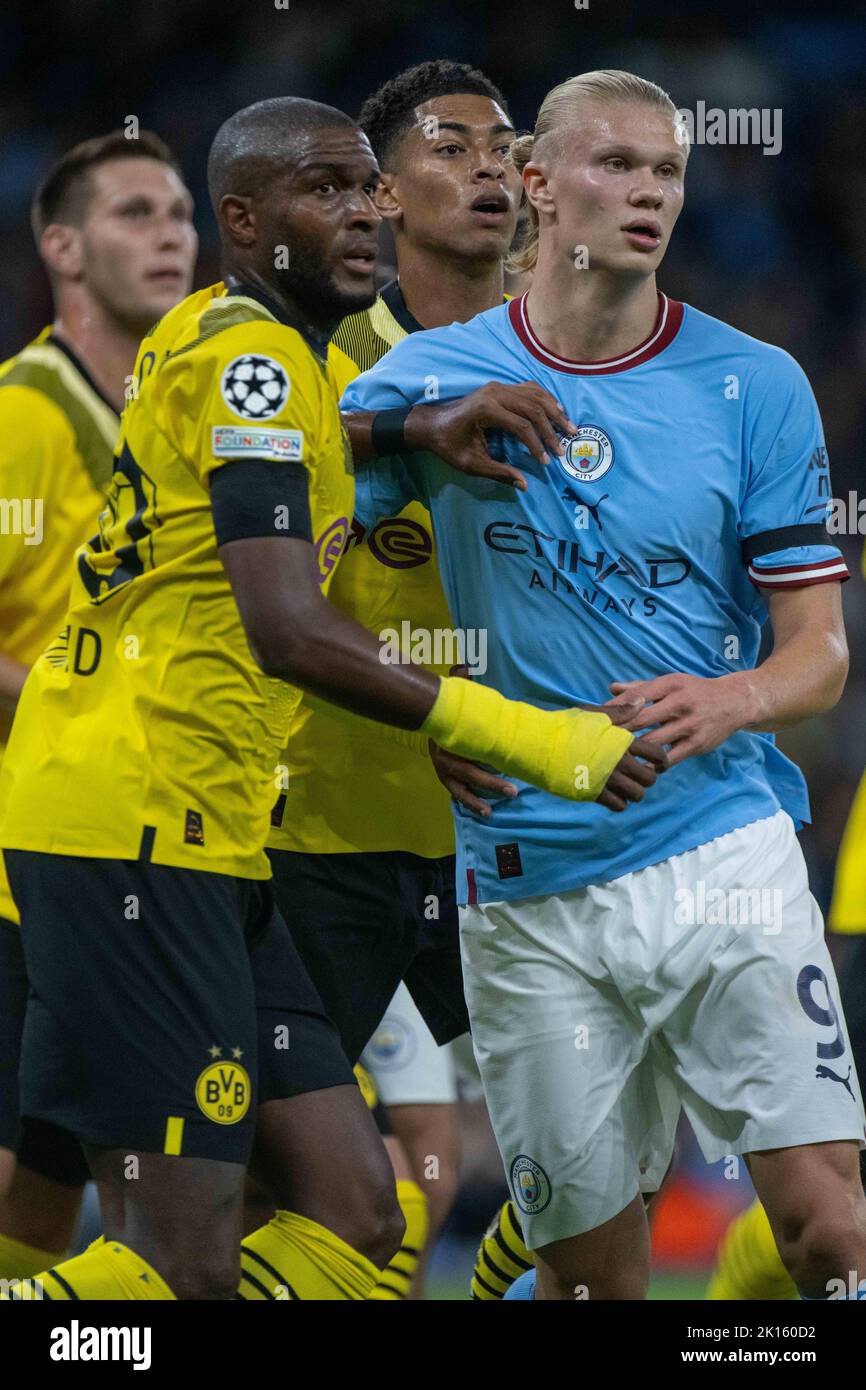 MANCHESTER, ENGLAND - SEPTEMBER 14: Erling Haaland of Manchester City and Jude Bellingham and Anthony Modeste of Borussia Dortmund during the UEFA Cha Stock Photo
