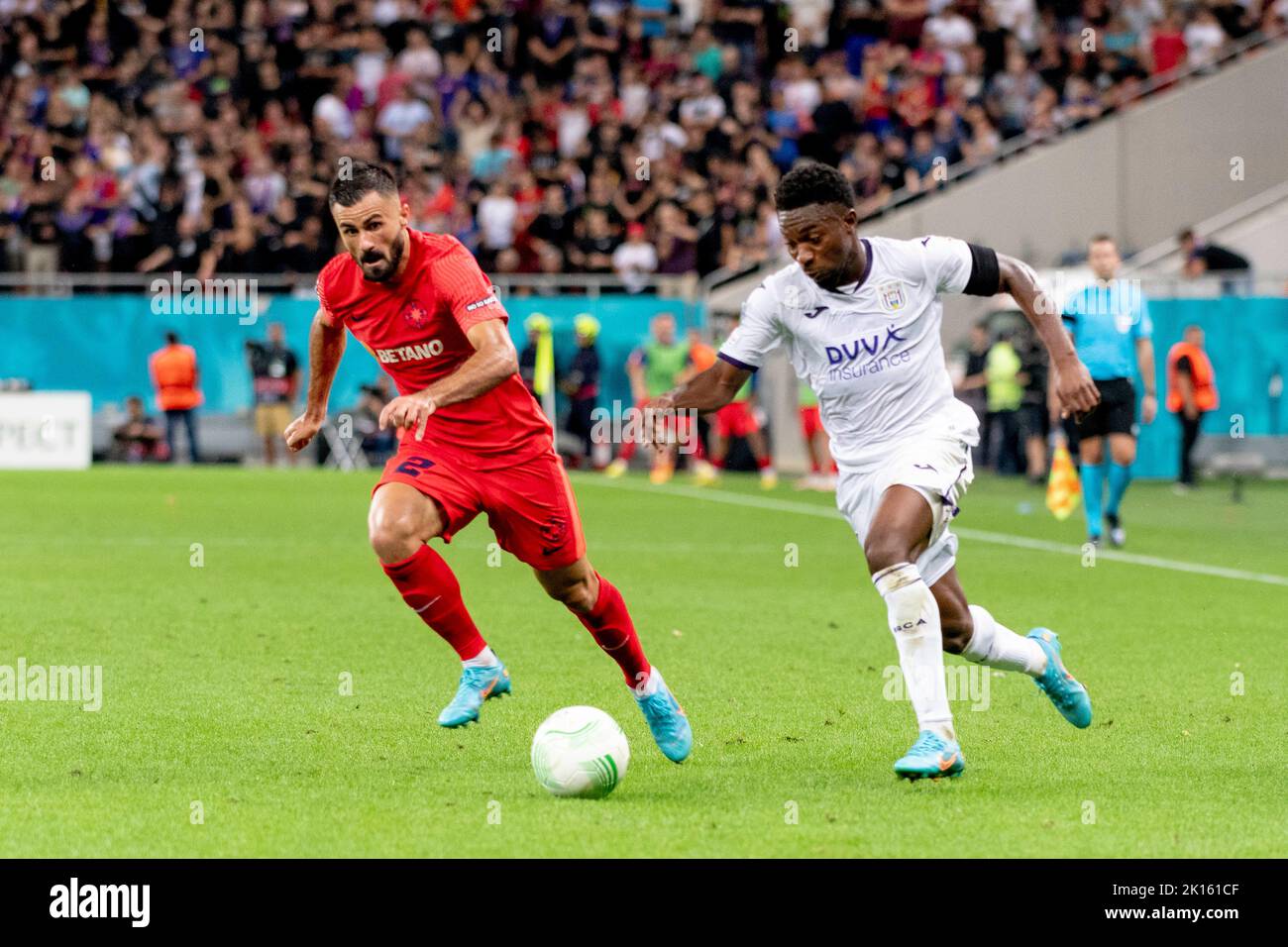 Bucharest, Romania. 15th Sep, 2022. September 15, 2022: Valentin Cretu #2 of FCSB and Francis Amuzu #7 of RSC Anderlecht during of the UEFA Europa Conference League group B match between FCSB Bucharest and RSC Anderlecht at National Arena Stadium in Bucharest, Romania ROU. Catalin Soare/Cronos Credit: Cronos/Alamy Live News Stock Photo