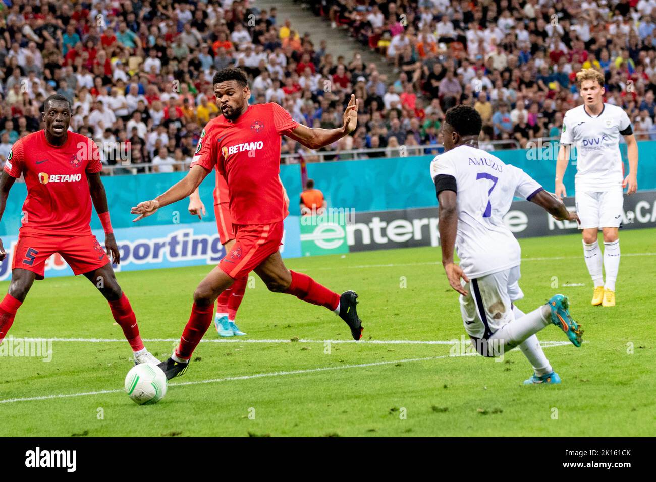 Bucharest, Romania. 15th Sep, 2022. September 15, 2022: Malcolm Edjouma #18 of FCSB and Francis Amuzu #7 of RSC Anderlecht during of the UEFA Europa Conference League group B match between FCSB Bucharest and RSC Anderlecht at National Arena Stadium in Bucharest, Romania ROU. Catalin Soare/Cronos Credit: Cronos/Alamy Live News Stock Photo