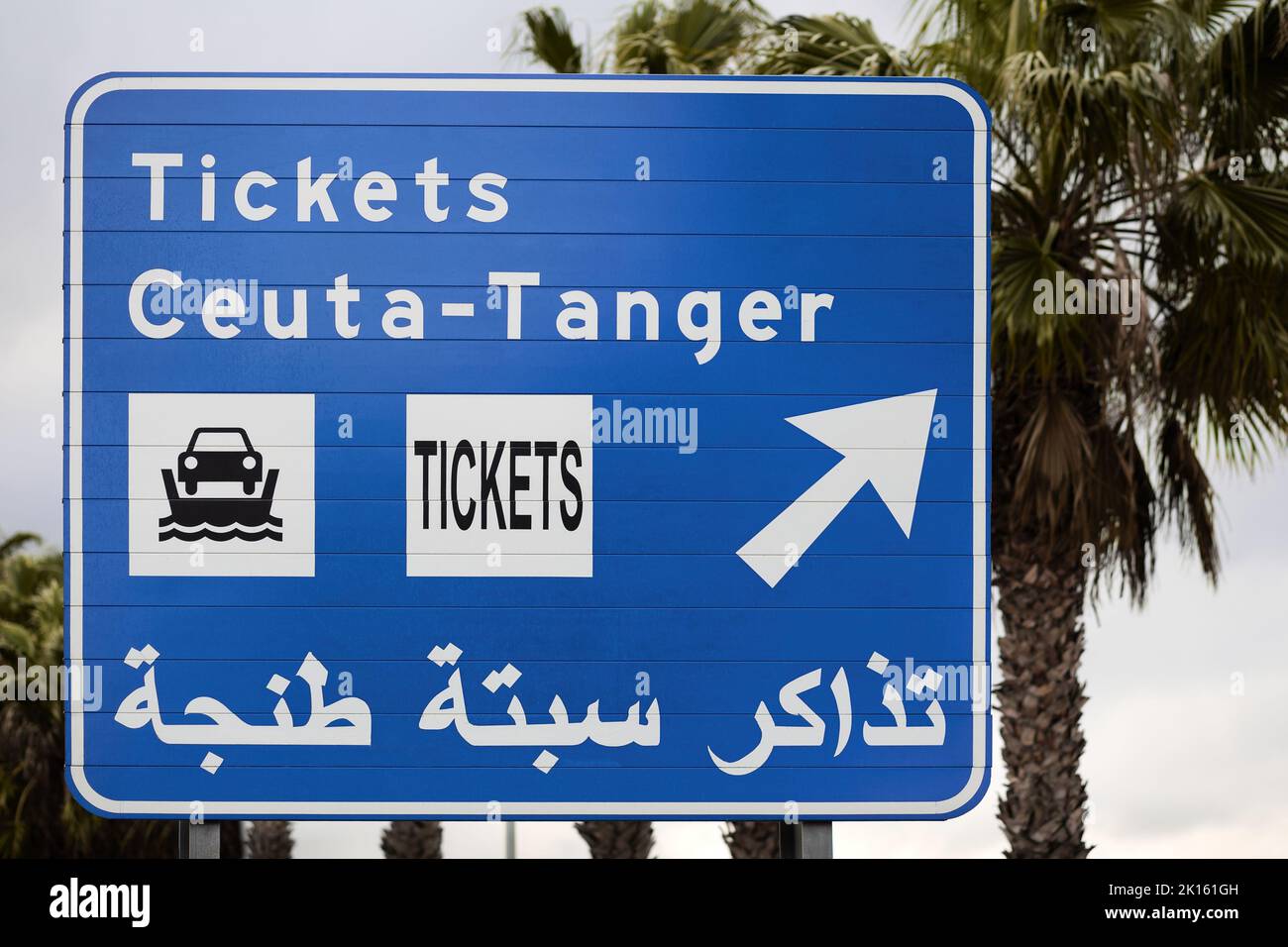 Ceuta tanger road traffic sign for car ferry boat ticket tickets spain with arabic lettering Stock Photo