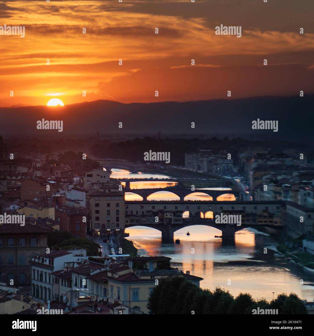 Sunset Ponte Vecchio bridge Florence Italy skyline Stock Photo