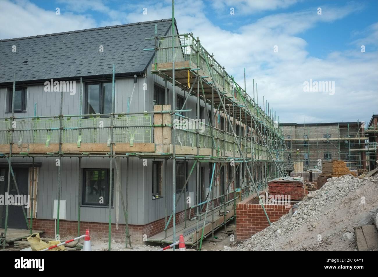 Scaffolding on New homes being built at a building site in Hampshire UK. New Affordable housing in United Kingdom. construction in UK Stock Photo
