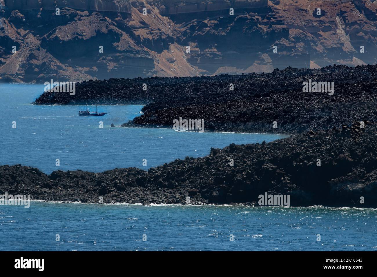 Santorini Greece cliffs & caldera bay Greek islands cruise - Royal Caribbean sailing volcanic cliff & Fira in Mediterranean Stock Photo